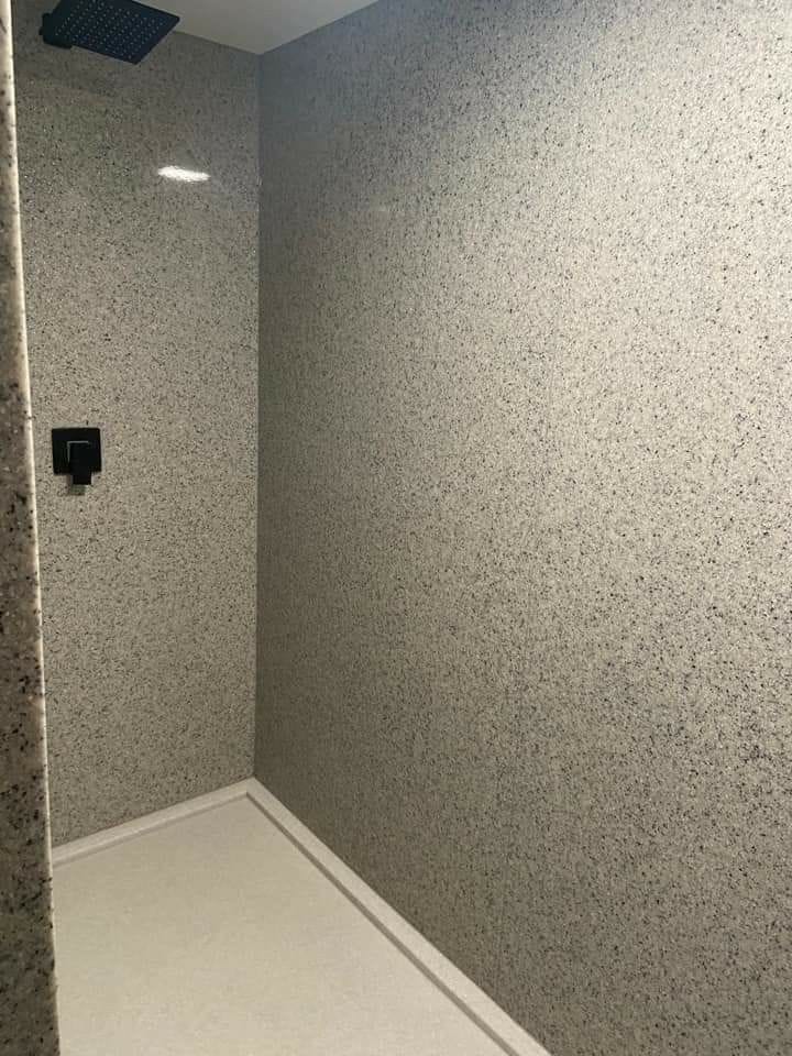 Aplicação de textura granfino em parede